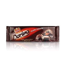 Prepare mouthwatering desserts with this Kras Dorina Cooking Chocolate Bar. Explore your culinary skills with it, make pudding, brownie or custard, your guests will be amazed after having these delicious recipes made with Kras Dorina Cooking Chocolate Bar. This dark chocolate bar is made of rich cocoa, cocoa butter and vanilla extract. Order today to make special dessert items for your friends and family.